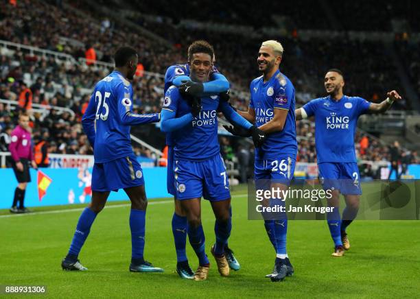 Demarai Gray of Leicester City celebrates scoring the 2nd Leicester goal with Riyad Mahrez and Wilfred Ndidi during the Premier League match between...