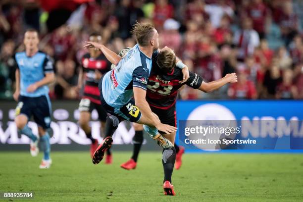 Sydney FC defender Jordy Buijs and Western Sydney Wanderers Lachlan Scott come together at the Hyundai A-League match between Western Sydney...