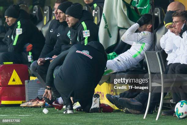 Fin Bartels of Bremen receives medical help during the Bundesliga match between Borussia Dortmund and SV Werder Bremen at Signal Iduna Park on...