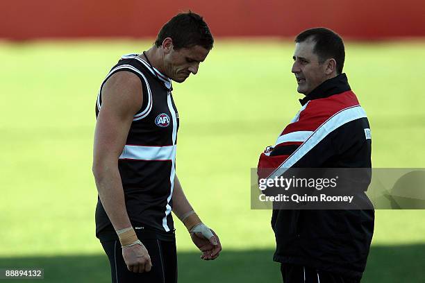 Ross Lyon the coach of the saints speaks to Michael Gardiner during a St Kilda Saints AFL training session held at Linen House Oval on July 8, 2009...