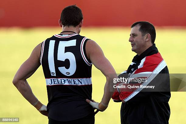 Ross Lyon the coach of the saints speaks to Michael Gardiner during a St Kilda Saints AFL training session held at Linen House Oval on July 8, 2009...