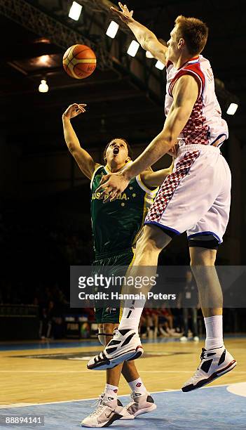 Jorden Page of Australia shoots during the U19 Basketball World Championships match between Australia and Croatia at North Shore Events Centre on...