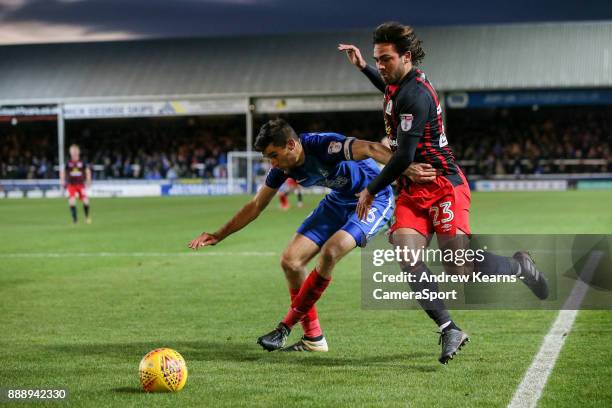 Blackburn Rovers' Bradley Dack tries to go around Peterborough United's Jack Baldwin during the Sky Bet League One match between Peterborough United...