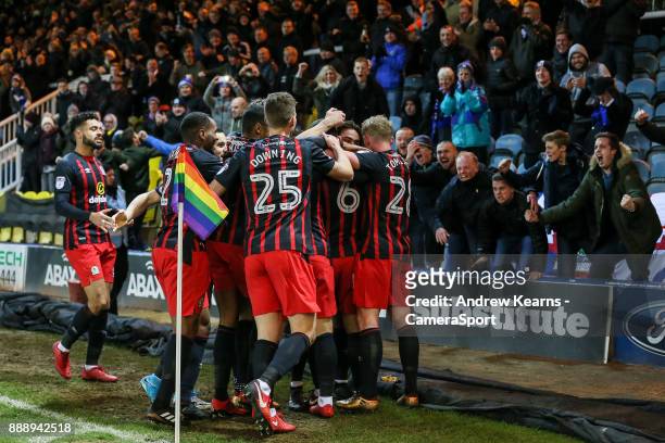Blackburn Rovers' players celebrate their second goal in front of their travelling fans during the Sky Bet League One match between Peterborough...