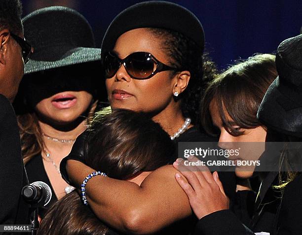 Michael Jackson's son, Prince Michael Jackson I , leans on the shoulder of his aunt Janet Jackson as she comforts Paris Jackson, Michael Jackson's...