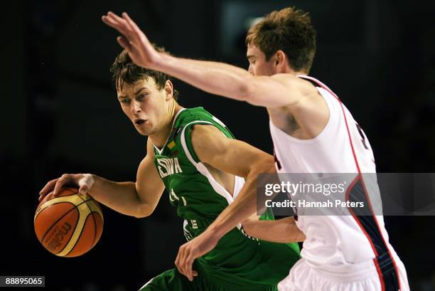 Donatas Motiejunas of Lithuania tries to get past Gordon Hayward of the United States defends during the U19 Basketball World Championships match...