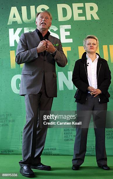 German Greens party lead elections candidates Juergen Trittin and Renate Kuenast speak during the campaign for the next federal elections in...