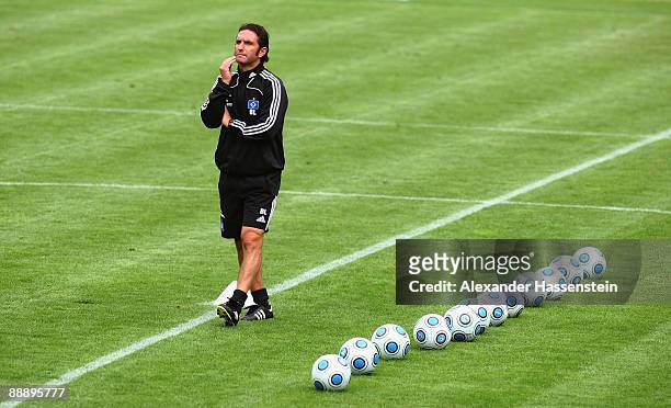 Bruno Labbadia, head coach of Hamburg looks on during a training session at day three of the Hamburger SV training camp on July 8, 2009 in...