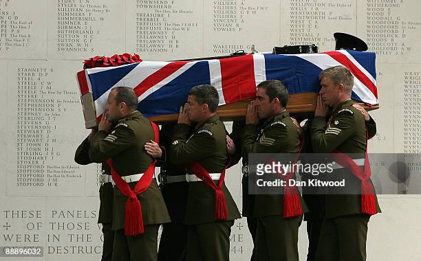 The coffin of Maj Sean Birchall is taken into Guards Chapel during his funeral on July 8, 2009 in London, England. Maj Birchall of 1st Battalion...