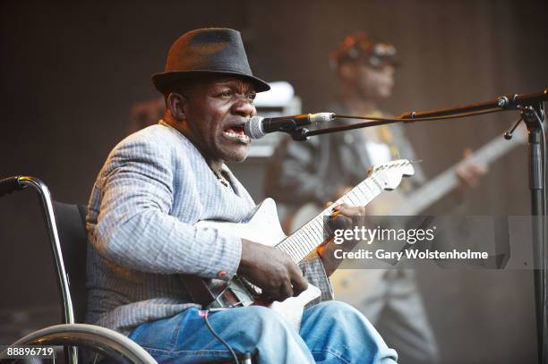 Staff Benda Bilili perform on stage on the third day of Eurockneennes Festival at Malsaucy on July 5, 2009 in Belfort, France.