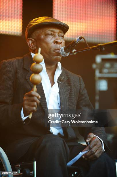 Staff Benda Bilili perform on stage on the third day of Eurockneennes Festival at Malsaucy on July 5, 2009 in Belfort, France.