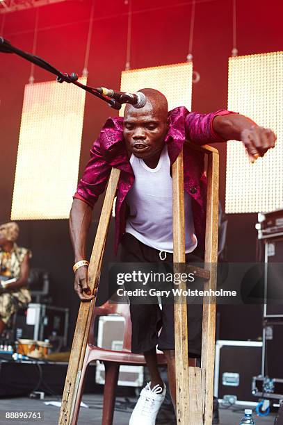 Staff Benda Bilili perform on stage on the third day of Eurockneennes Festival at Malsaucy on July 5, 2009 in Belfort, France.