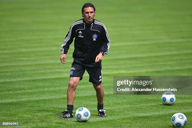 Bruno Labbadia, head coach of Hamburg looks on during a training session at day three of the Hamburger SV training camp on July 8, 2009 in...