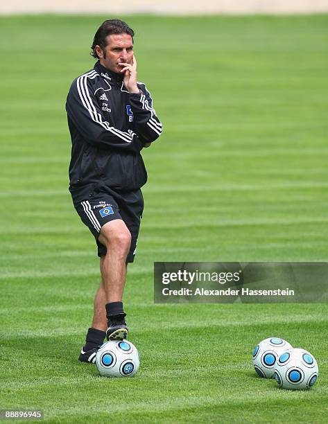 Bruno Labbadia, head coach of Hamburg looks on during a training session at day three of the Hamburger SV training camp on July 8, 2009 in...