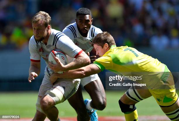 Ben Pinkelman of Untied States and Tim Anstee of Australia during day 1 of the 2017 HSBC Cape Town Sevens match between Australia and United States...