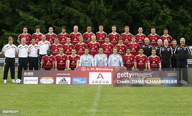 Players and team members of German first division Bundesliga football club 1. FC Nuremberg pose for a group picture during the team presentation on...