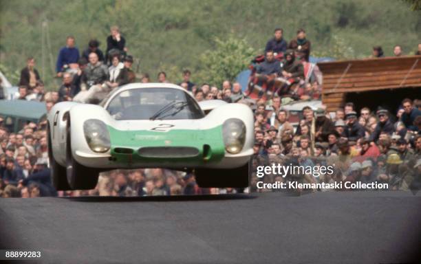 The Nürburgring 1000km. Race; Nürburgring, May 31, 1970. Flying Porsche! The 908/2 of Rudi Lins and Willy Kauhsen takes a big leap at Brünnchen. They...