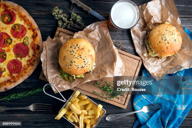 unhealthy food ready to eat - burger and fries stock pictures, royalty-free photos & images