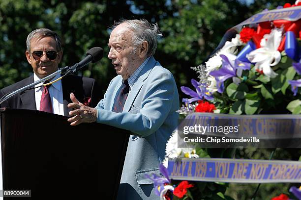 Pulitzer Prize winner and Vietnam War expert Stanley Karnow speaks as Vietnam Veterans Memorial Fund founder and President Jan Scruggs looks on...