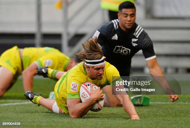 Lewis Holland of Australia scores a try during day 1 of the 2017 HSBC Cape Town Sevens match between New Zealand and Australia at Cape Town Stadium...