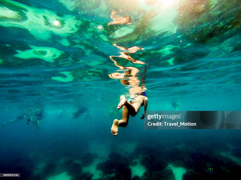 Woman snorkeling in Phuket, Thailand