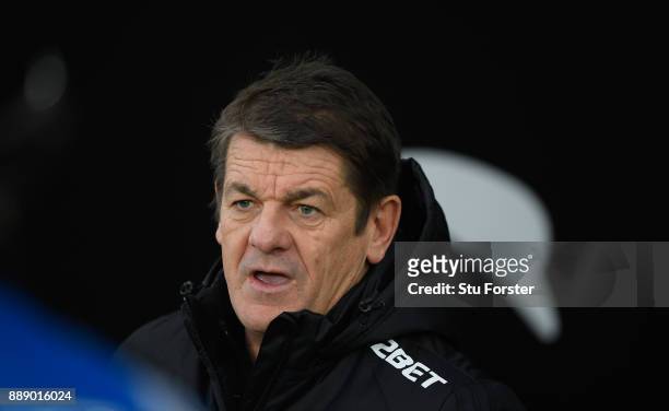 Assistant manager John Carver looks on during the Premier League match between Swansea City and West Bromwich Albion at Liberty Stadium on December...