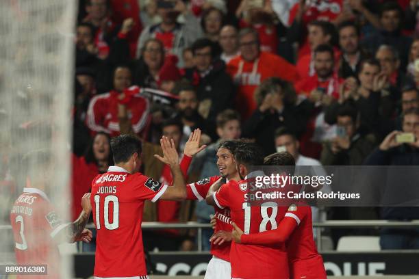 Benfica's midfielder Filip Krovinovic from Croatia celebrates scoring Benfica third goal with team mates during the match between SL Benfica and...