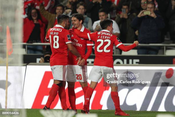Benfica's midfielder Filip Krovinovic from Croatia celebrates scoring Benfica third goal with team mates during the match between SL Benfica and...