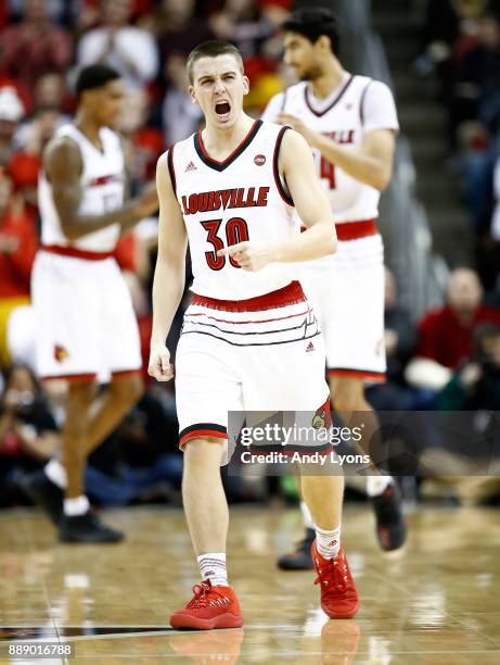 Ryan McMahon of the Louisville Cardinals celebrates during the game against the Indiana Hoosiers at KFC YUM! Center on December 9, 2017 in...