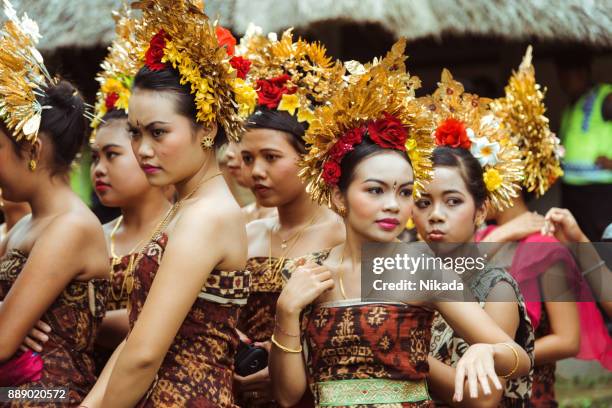 group of beautiful balinese women in traditional costumes - period costume stock pictures, royalty-free photos & images