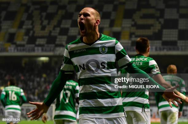 Sporting's Dutch forward Bas Dost celebrates after scoring his second goal during the Portuguese league football match between Boavista and Sporting...