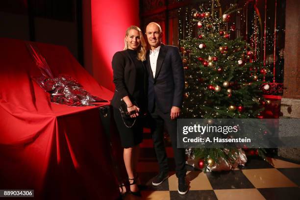 Arjen Robben of FC Bayern Muenchen arrives with his wife Bernadien Robben at Palais Lenbach for the FC Bayern Muenchen Christmas Party 2017 on...