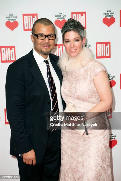 Cheryl Shepard and her husband Nikolaus Okonkwo attend the Ein Herz Fuer Kinder Gala at Studio Berlin Adlershof on December 9, 2017 in Berlin,...