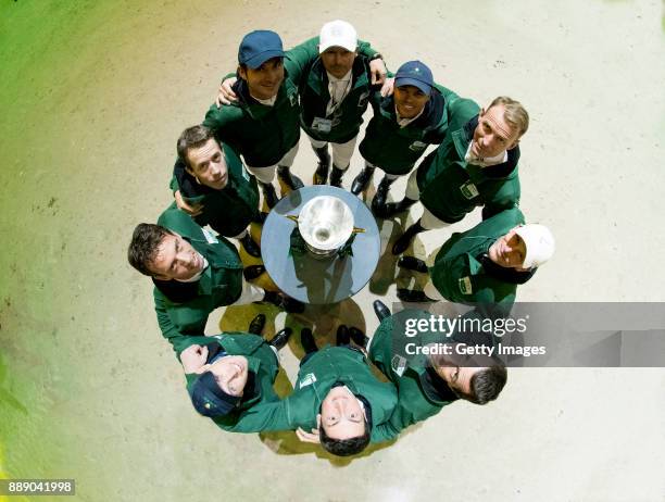 The Rolex IJRC Top 10 Final riders encircle the Top 10 Trophy, Harrie Smolders, Maikel van der Vlueten , Steve Guerdat, Eric Lamaze, Kent Farrington,...