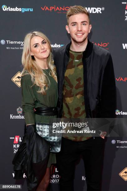 Christoph Kramer and his girlfriend Celina attends the 1Live Krone radio award at Jahrhunderthalle on December 07, 2017 in Bochum, Germany.