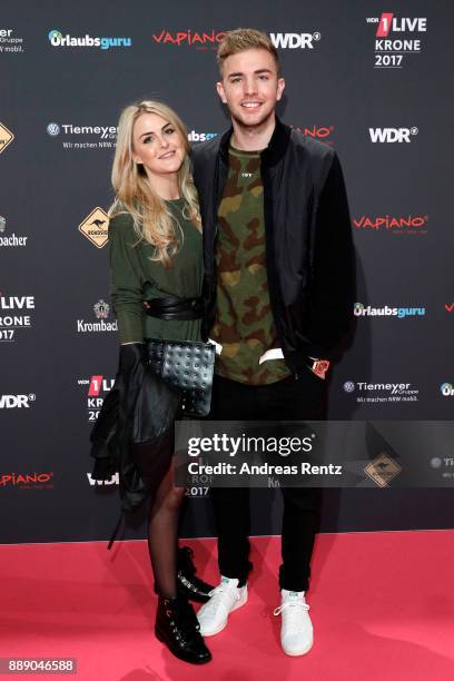 Christoph Kramer and his girlfriend Celina attends the 1Live Krone radio award at Jahrhunderthalle on December 07, 2017 in Bochum, Germany.