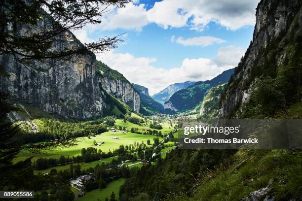 view of lauterbrunnen switzerland on summer afternoon - lauterbrunnen stock pictures, royalty-free photos & images