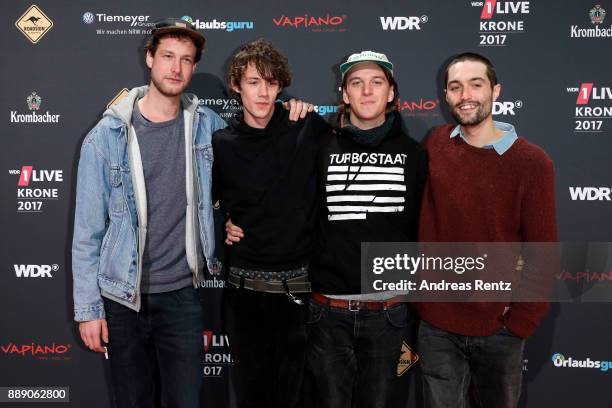 Severin Kantereit, Henning May, Malte Huck and Christopher Annen of the band 'AnnenMayKantereit' attend the 1Live Krone radio award at...