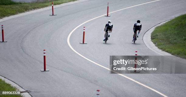road bicycle time trial race - close to finish line stock pictures, royalty-free photos & images