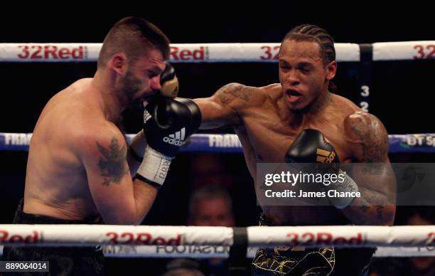 Anthony Yarde punches Nikola Sjekloca during there WBO European Light Heavyweight and WBO Inter-Continental Light Heavyweight Title fight at Copper...