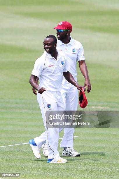 Kemar Roach of the West Indies celebrates after claiming the wicket of Tim Southee of New Zealand during day two of the Second Test Match between New...