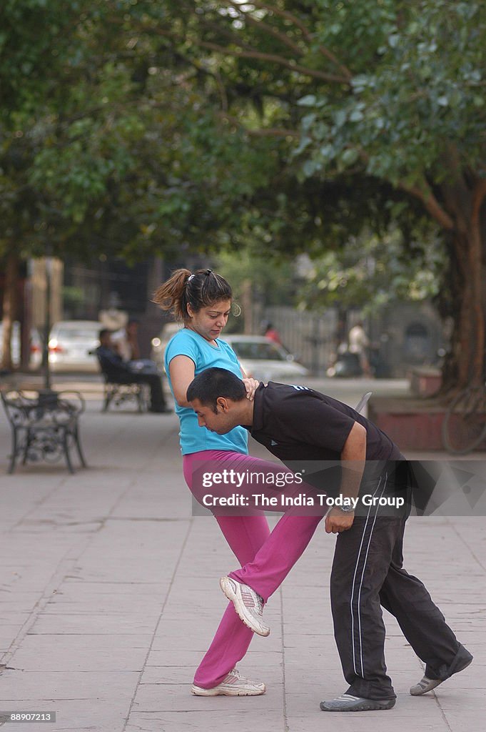 Students learn the Israeli self defence technique known as Krav Maga at a school run by Vikky Kapoor in New Delhi, India ( for IT Woman Magazine )