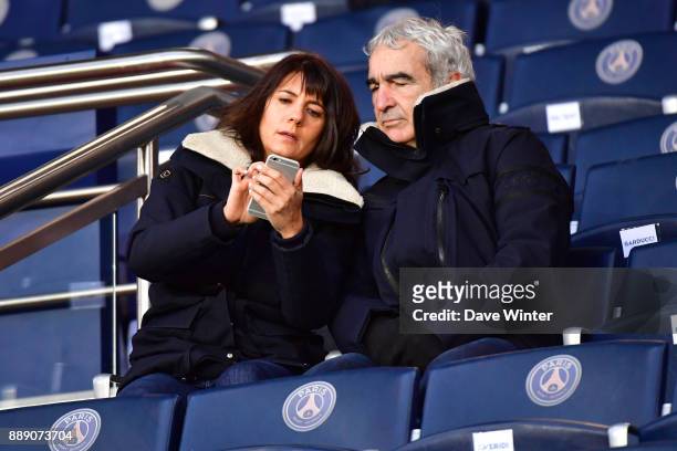 Former France coach Raymond Domenech with his partner, tv journalist Estelle Denis, during the Ligue 1 match between Paris Saint Germain and Lille...
