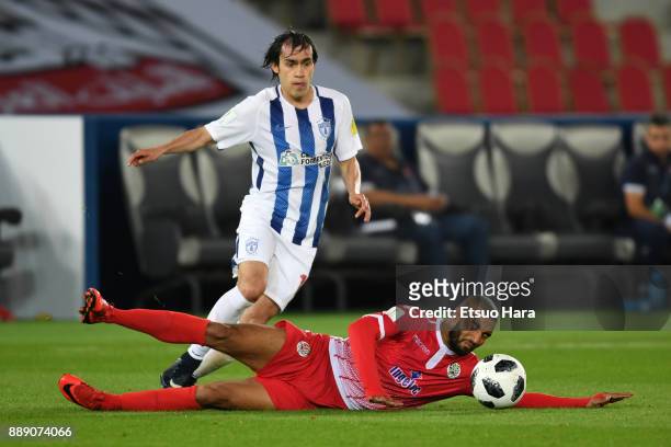 Jorge Hernandez of Pachuca and Mohamed Aoulad Youssef of Wydad Casablanca compete for the ball during the FIFA Club World Cup match between CF...
