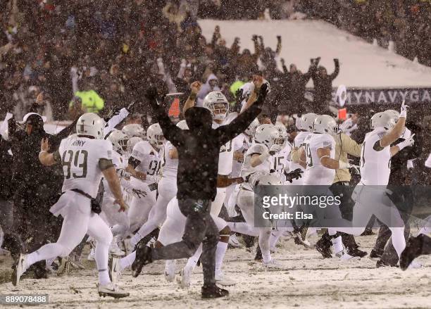 The Army Black Knights celebrates the win over the Navy Midshipmen on December 9, 2017 at Lincoln Financial Field in Philadelphia, Pennsylvania.The...