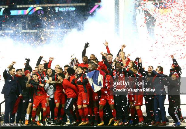 Michael Bradley of Toronto FC lifts the Championship Trophy after winning the 2017 MLS Cup Final against the Seattle Sounders at BMO Field on...