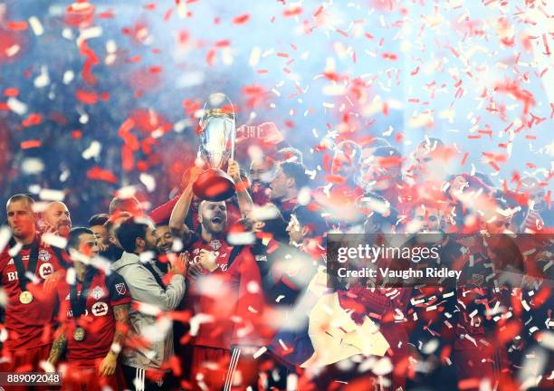 Michael Bradley of Toronto FC lifts the Championship Trophy after winning the 2017 MLS Cup Final against the Seattle Sounders at BMO Field on...