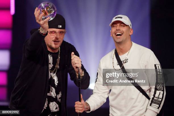 Bonez MC and RAF Camora speak on stage after receiving the award for best hip-hop-act during the 1Live Krone radio award at Jahrhunderthalle on...