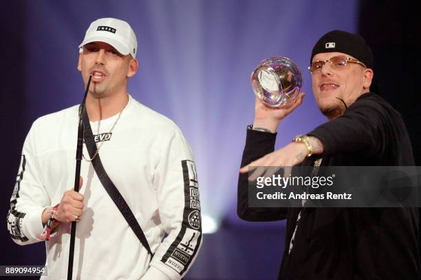 Bonez MC and RAF Camora speak on stage after receiving the award for best hip-hop-act during the 1Live Krone radio award at Jahrhunderthalle on...