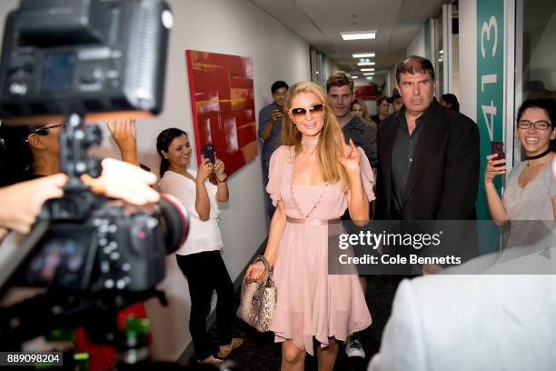 Paris Hilton makes her way through crowds of fans during a promotion visit to Australia to launch her 23rd fragrance, Rosé Rush on November 30, 2017...